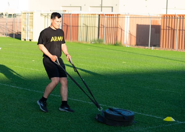 Sled Sprint Training: Why Distance, Load, and Surface Dictate Your Speed Gains